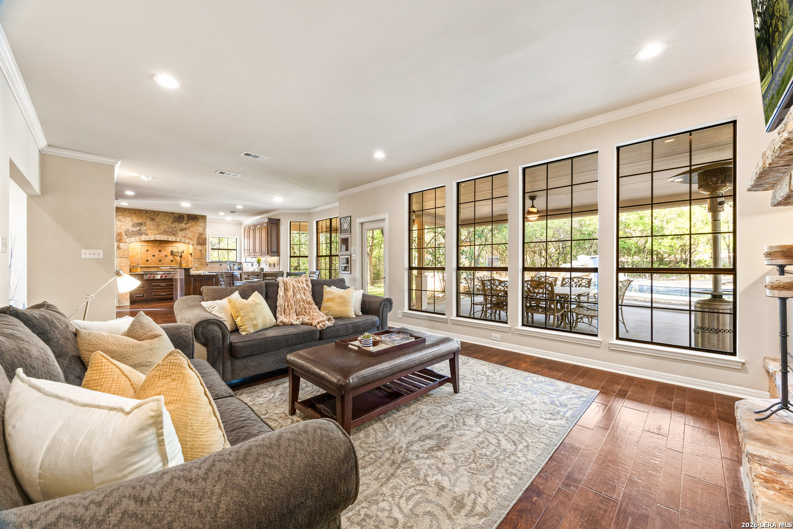31586 Scarteen Fair Oaks Ranch, TX 78015 - Photo 19 of 67 a living room with furniture and a large window