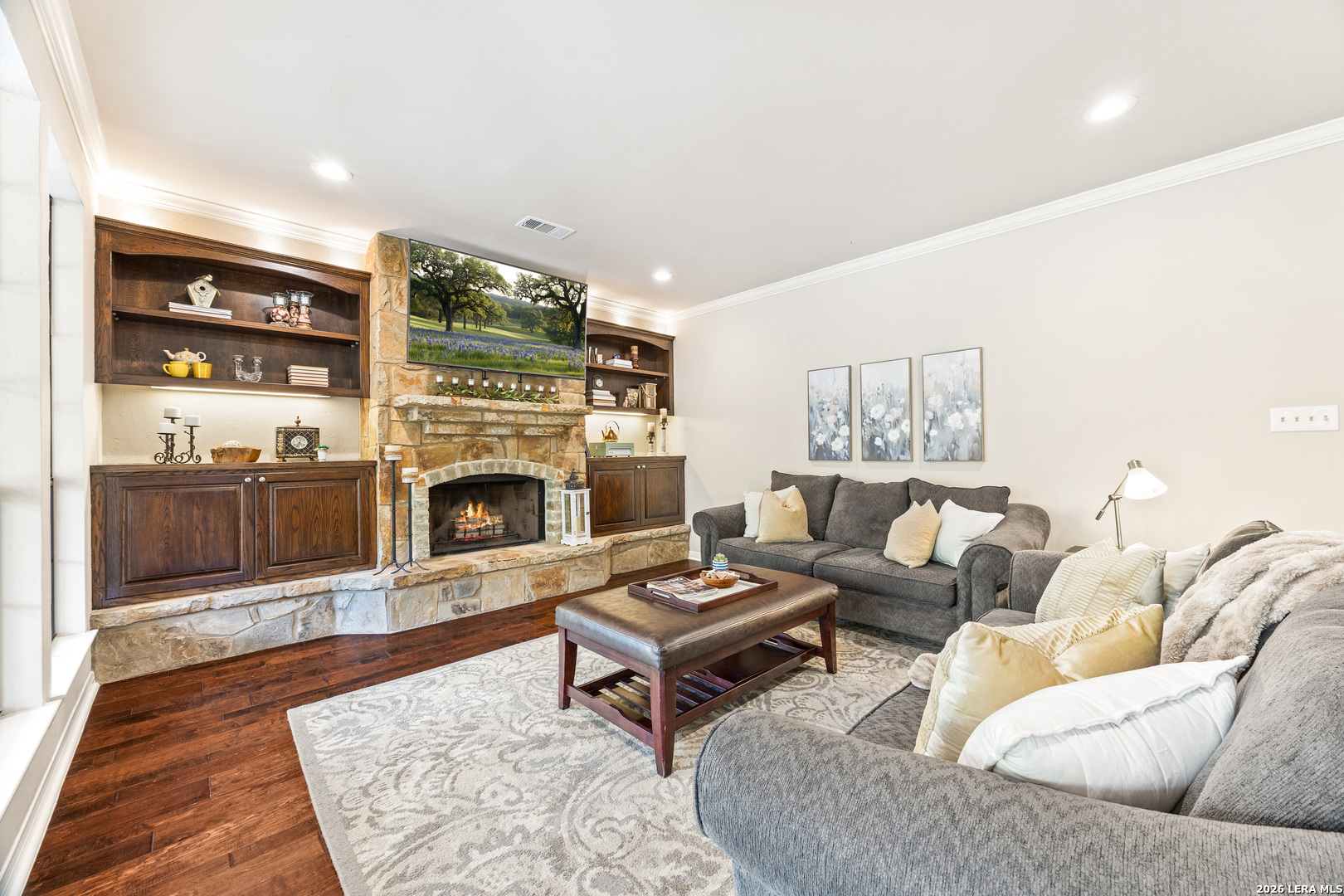 31586 Scarteen Fair Oaks Ranch, TX 78015 - Photo 20 of 67 a living room with furniture and a fireplace