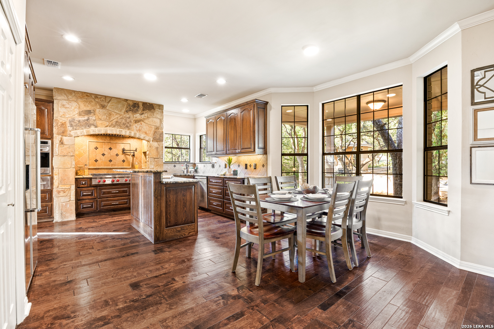 31586 Scarteen Fair Oaks Ranch, TX 78015 - Photo 21 of 67 a view of a dining room with furniture and wooden floor