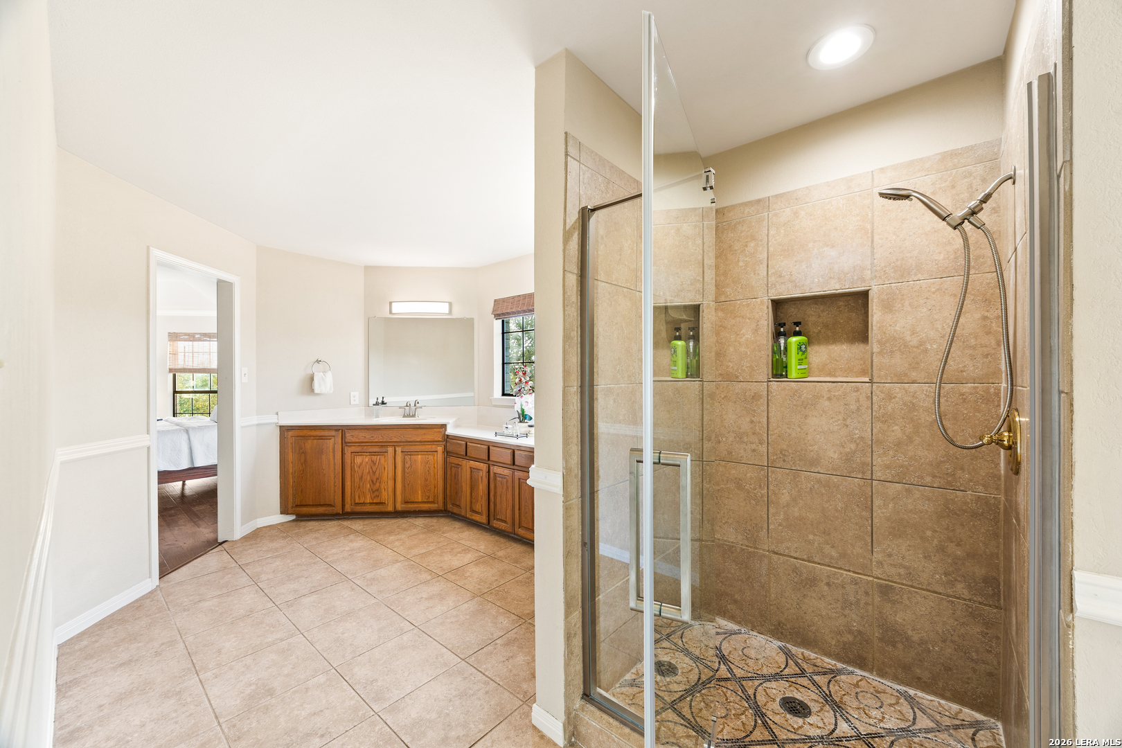 31586 Scarteen Fair Oaks Ranch, TX 78015 - Photo 33 of 67 a bathroom with a tub shower and sink