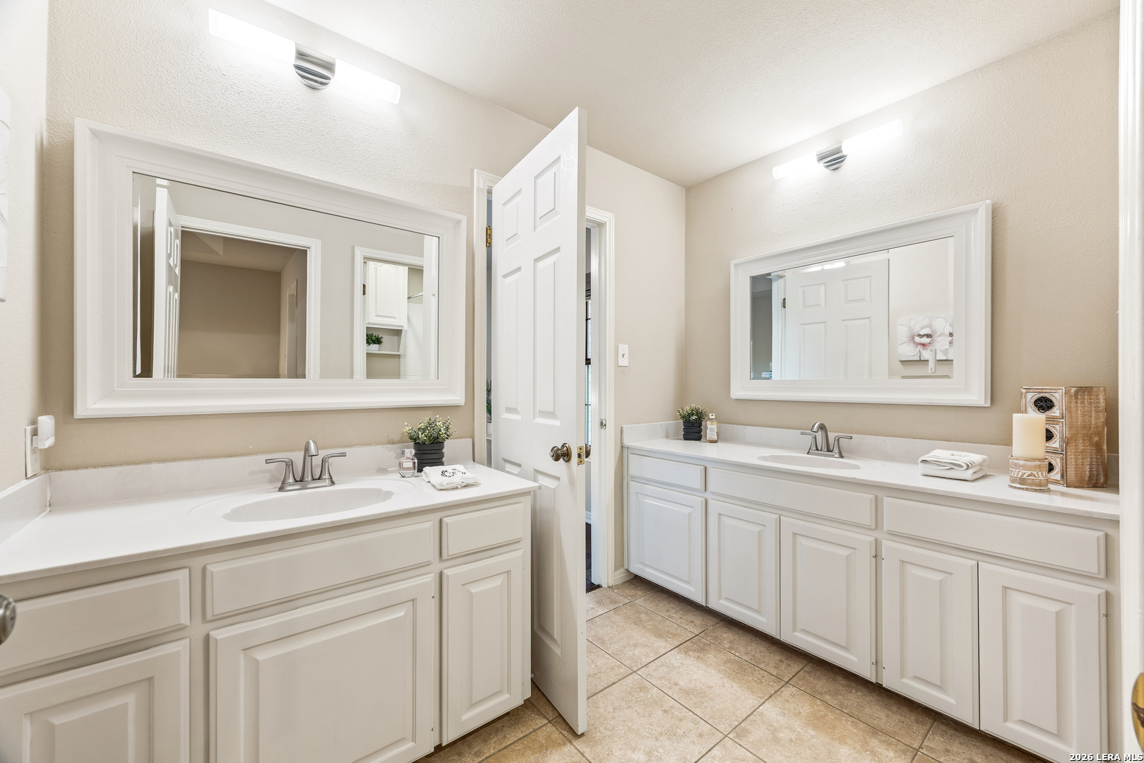 31586 Scarteen Fair Oaks Ranch, TX 78015 - Photo 38 of 67 a bathroom with a double vanity sink mirror and