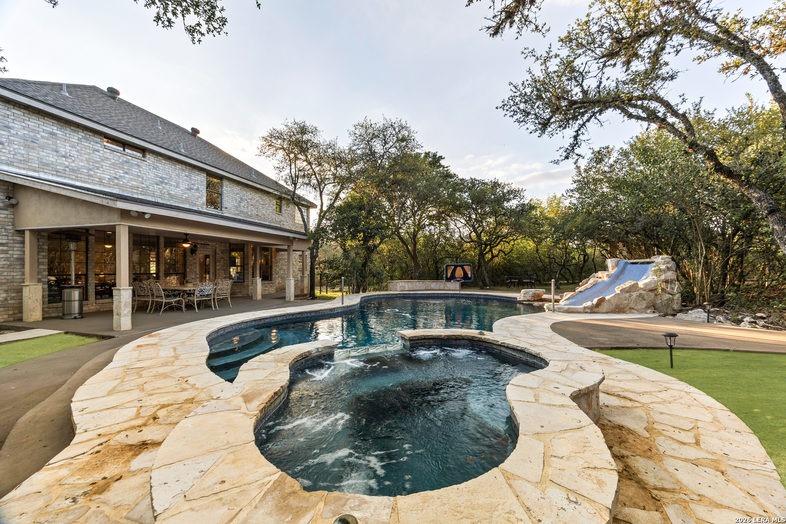 31586 Scarteen Fair Oaks Ranch, TX 78015 - Photo 43 of 67 a view of a house with backyard