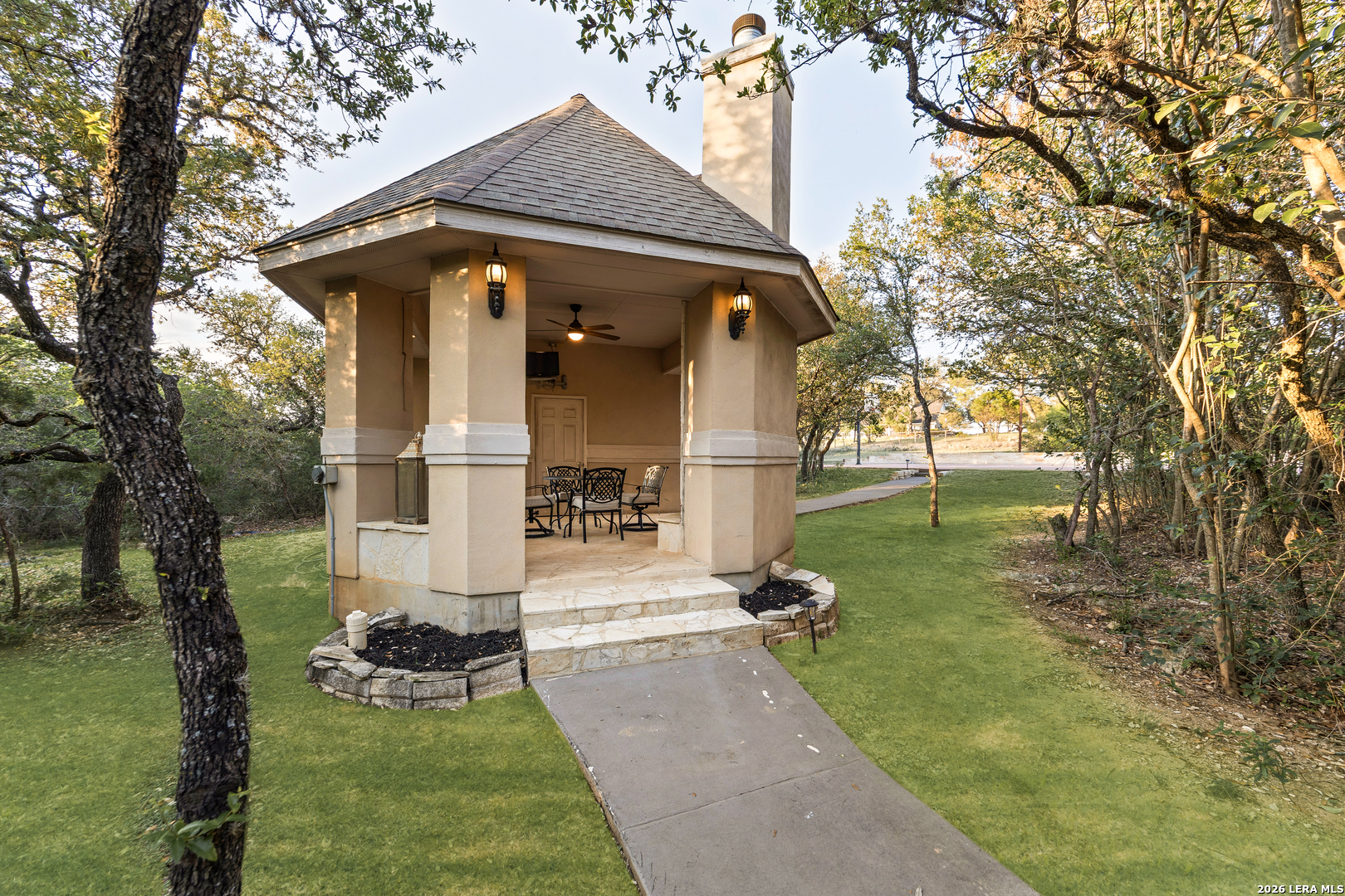 31586 Scarteen Fair Oaks Ranch, TX 78015 - Photo 48 of 67 a front view of a house with garden