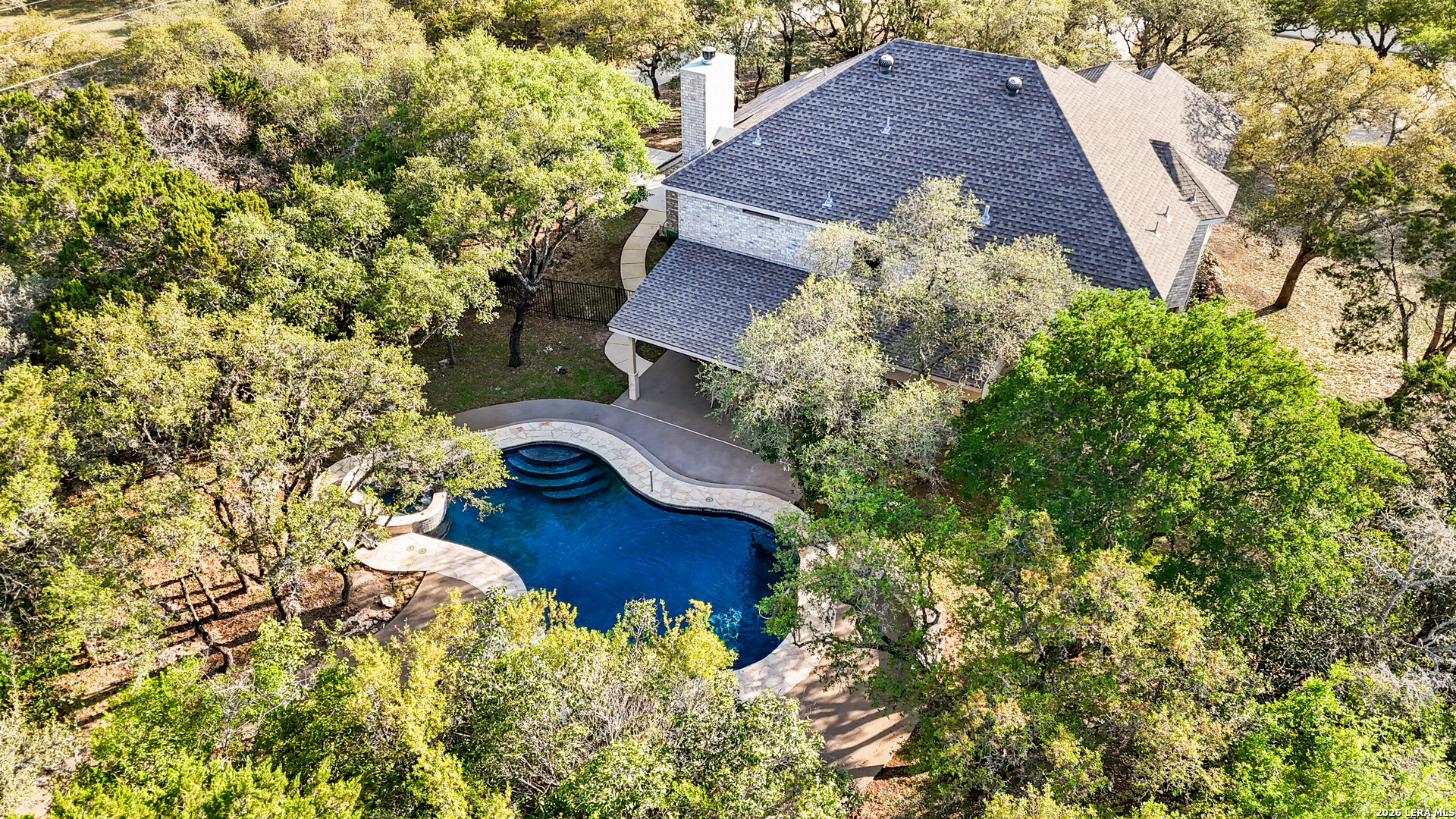 31586 Scarteen Fair Oaks Ranch, TX 78015 - Photo 52 of 67 a aerial view of a house with a yard