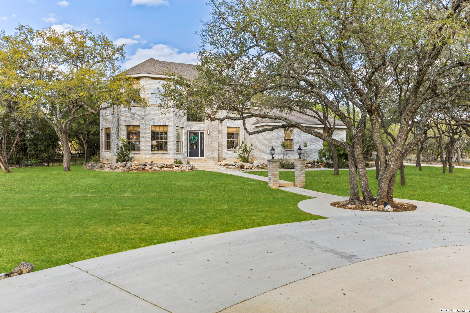 31586 Scarteen Fair Oaks Ranch, TX 78015 - Photo 59 of 67 a front view of house with yard and green space