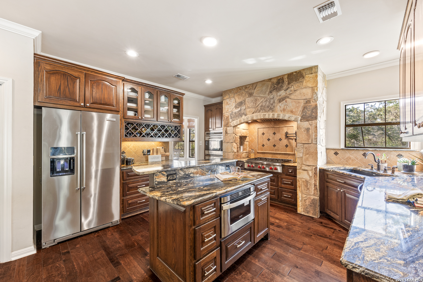 31586 Scarteen Fair Oaks Ranch, TX 78015 - Photo 6 of 67 a kitchen with stainless steel appliances granite countertop a stove a refrigerator and a refrigerator