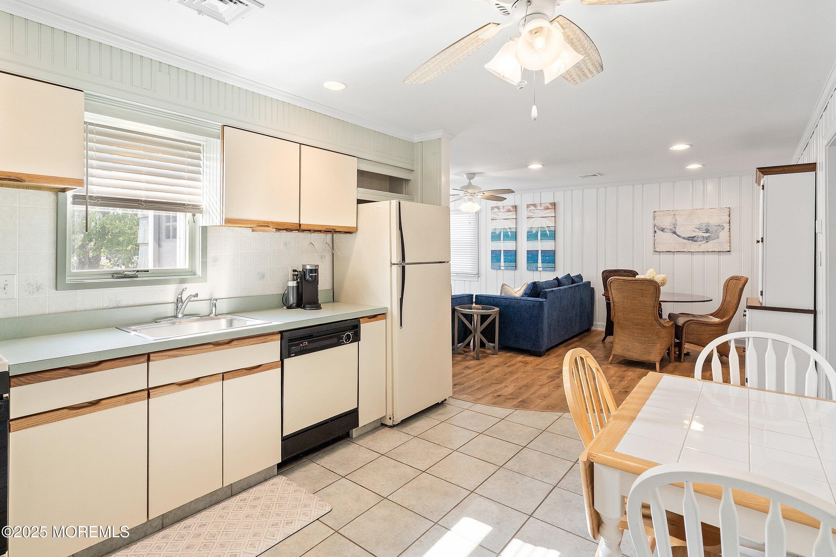 2003 Bay Boulevard Lavallette, NJ 08735 - Photo 18 of 31 a kitchen with stainless steel appliances granite countertop a sink and a refrigerator