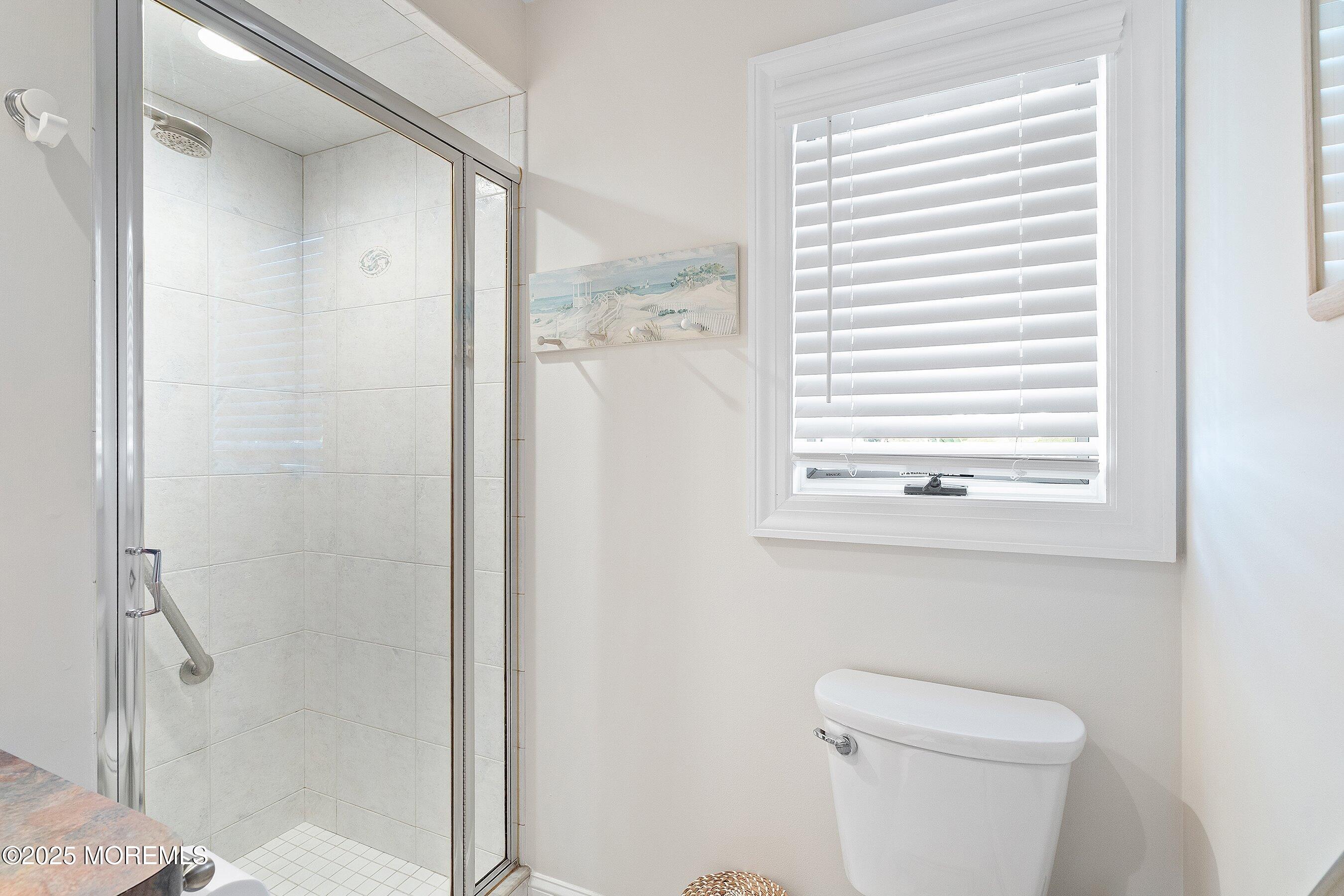 2003 Bay Boulevard Lavallette, NJ 08735 - Photo 22 of 31 a bathroom with a toilet and a shower