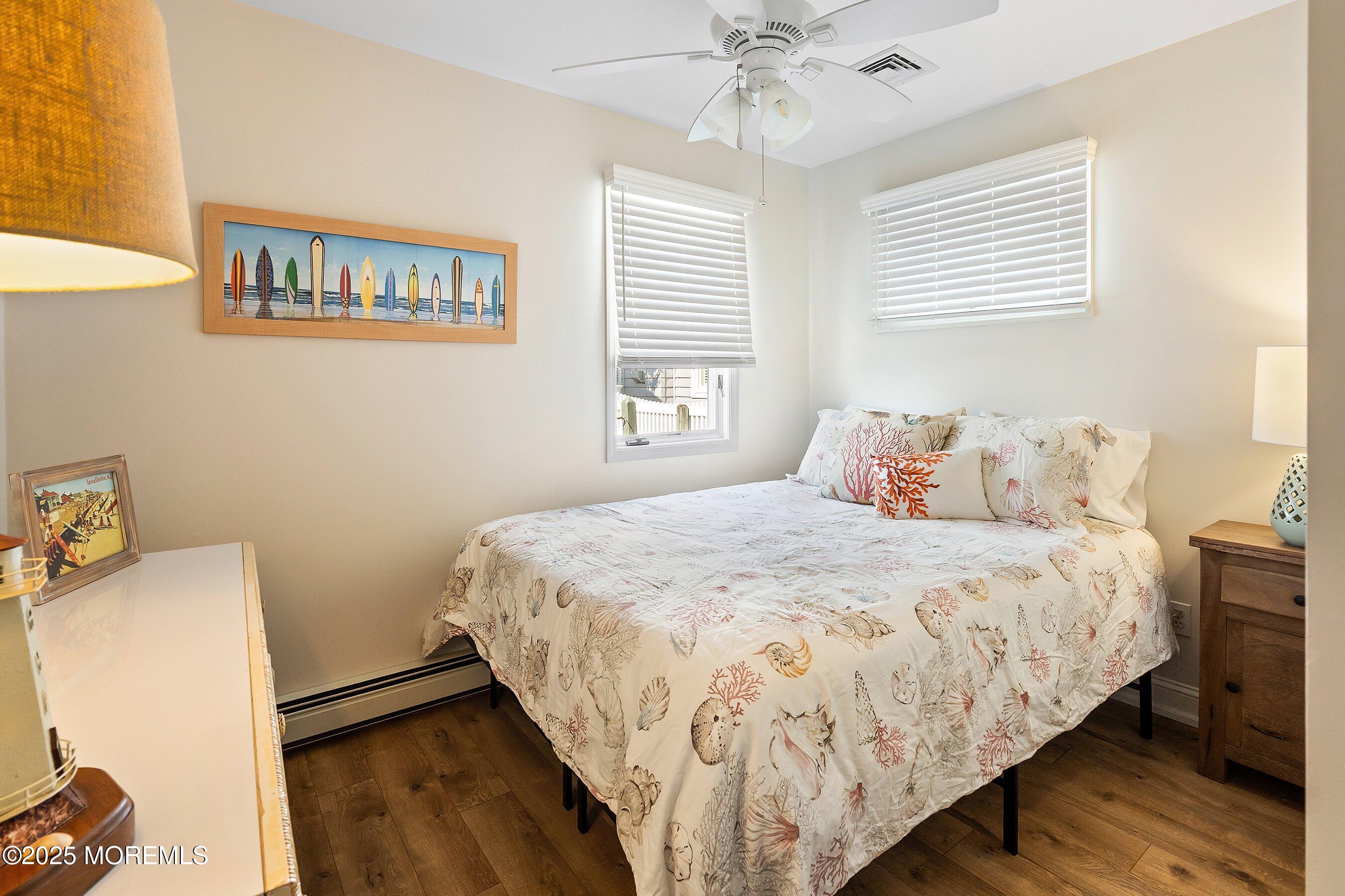 2003 Bay Boulevard Lavallette, NJ 08735 - Photo 23 of 31 a bedroom with a bed and a window