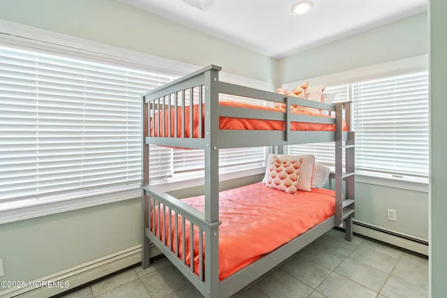 an aerial view of a house with yard