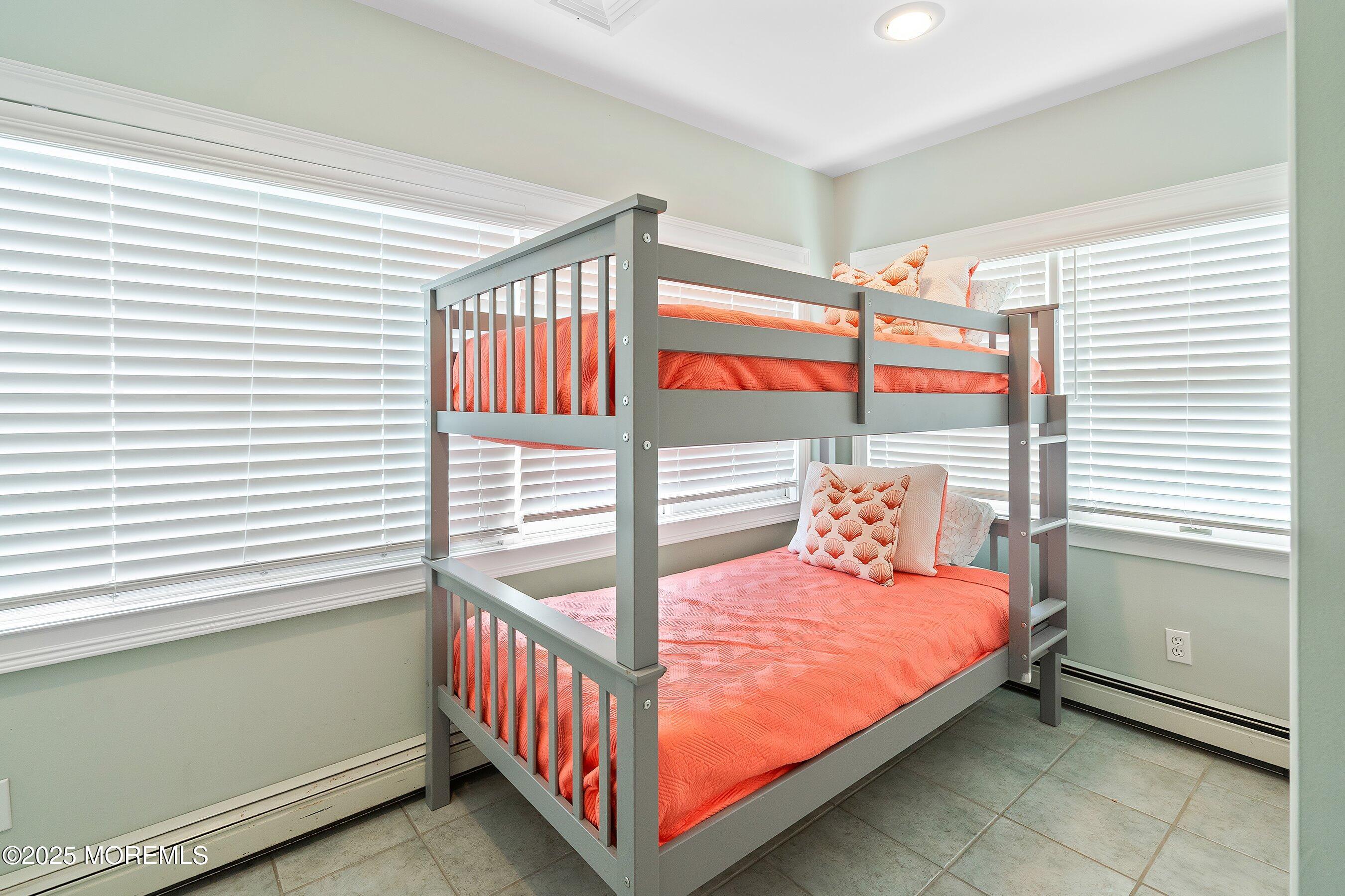 2003 Bay Boulevard Lavallette, NJ 08735 - Photo 25 of 31 a bedroom with a bed and a window