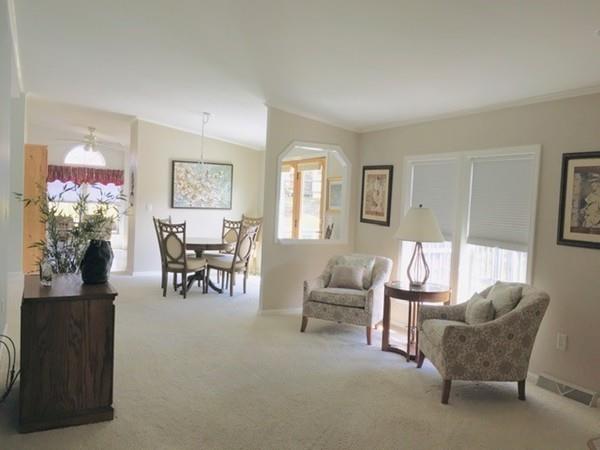 2602 Green Street Middleboro, MA 02346 - Photo 8 of 25 a living room with furniture and a potted plant