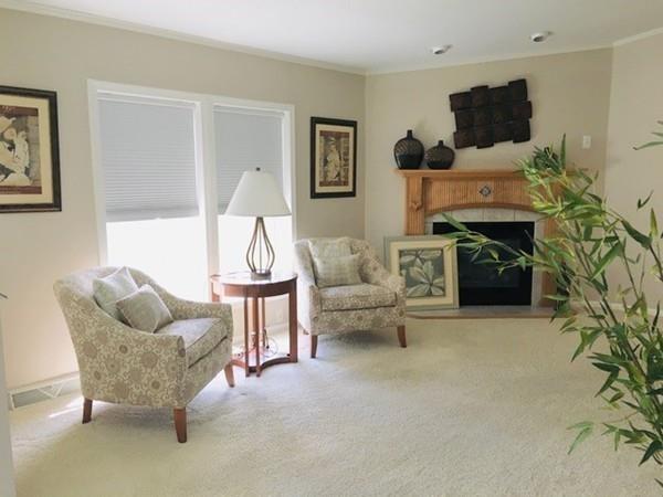 2602 Green Street Middleboro, MA 02346 - Photo 9 of 25 a living room with furniture and a fireplace