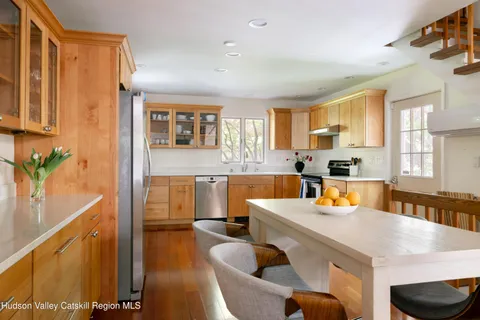 a large kitchen with a large window