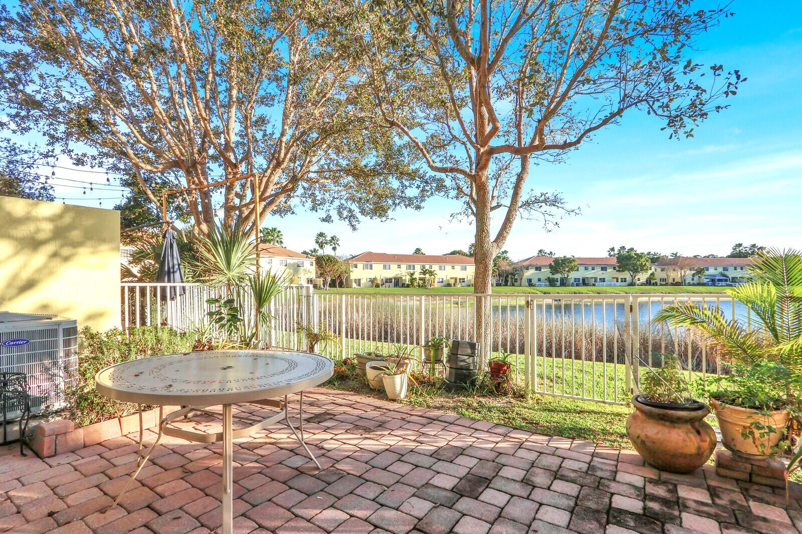 944 Imperial Lake Road West Palm Beach, FL 33413 - Photo 22 of 36 Paved Back Patio