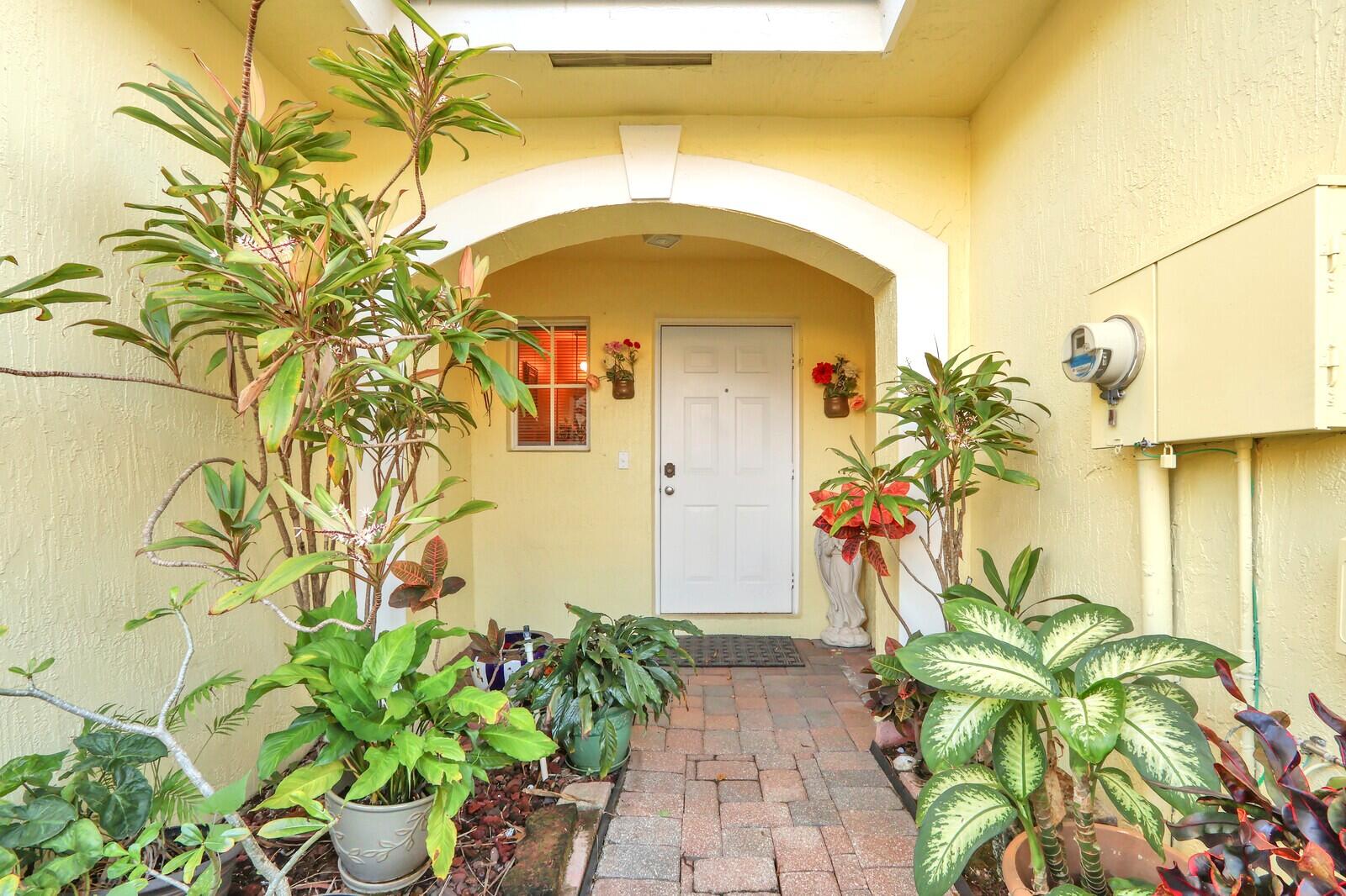 944 Imperial Lake Road West Palm Beach, FL 33413 - Photo 3 of 36 Covered Fron Entrance
