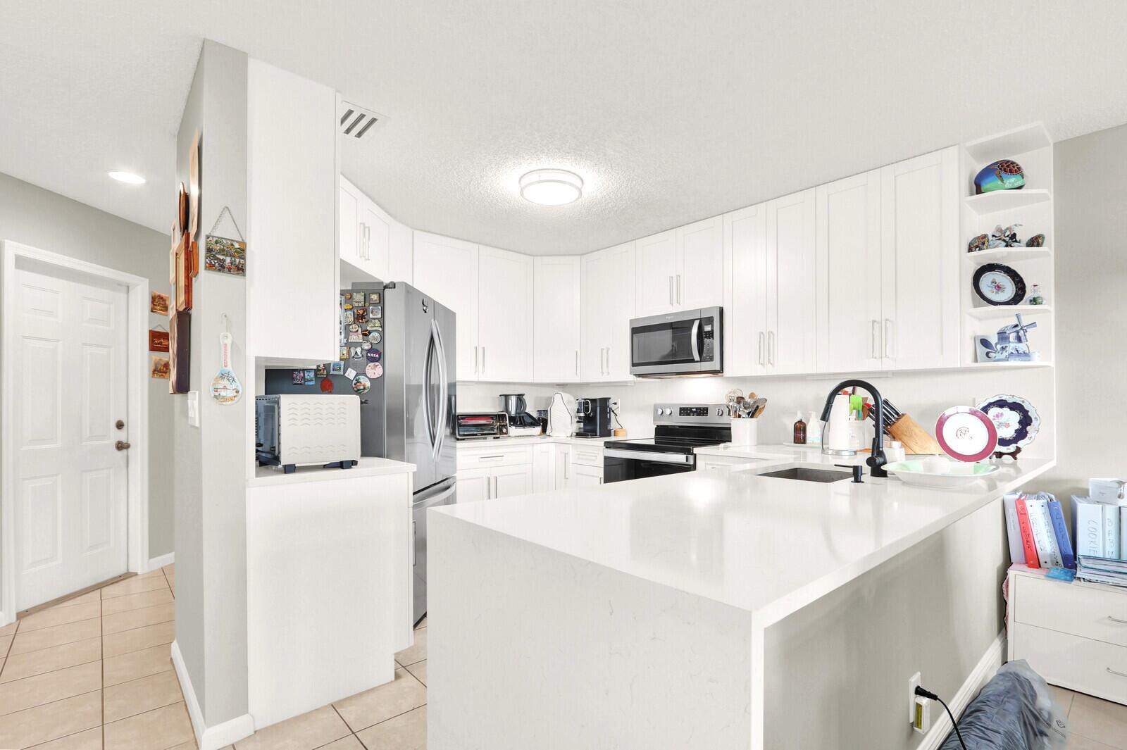 944 Imperial Lake Road West Palm Beach, FL 33413 - Photo 6 of 36 Open Kitchen
