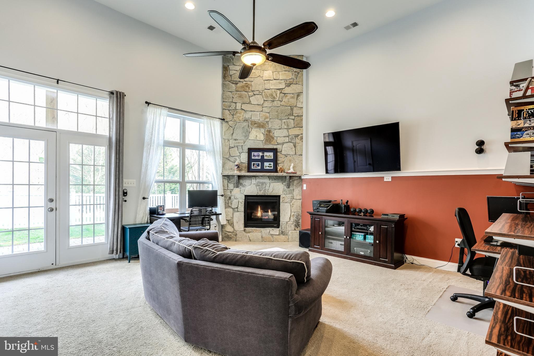 9362 Rock Ripple Lane Laurel, MD 20723 - Photo 23 of 34 Family room with beautiful stone gas fireplace