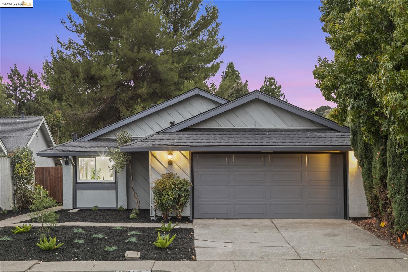 992 Coral Ridge Circle Rodeo, CA 94572 - Photo 1 of 1 a front view of a house with garden