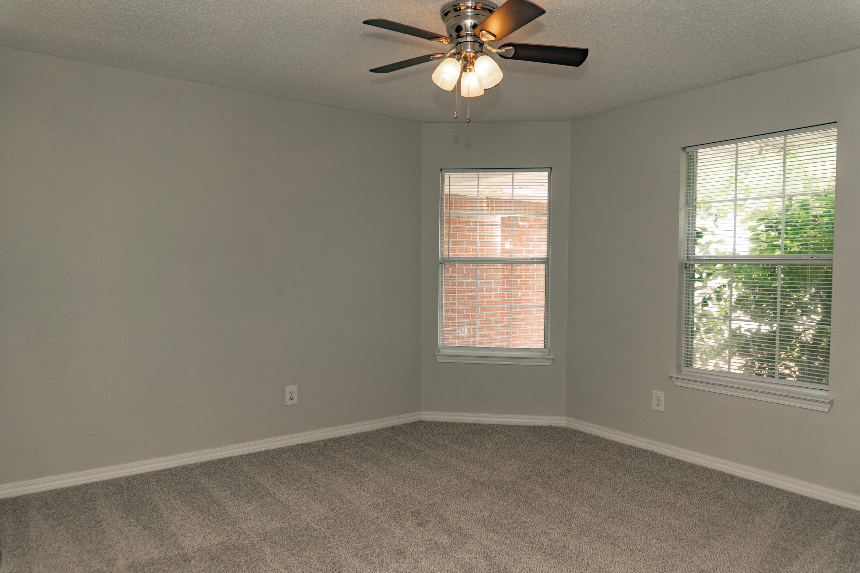5136 Whitehurst Lane Crestview, FL 32536 - Photo 11 of 24 an empty room with a window and a fan