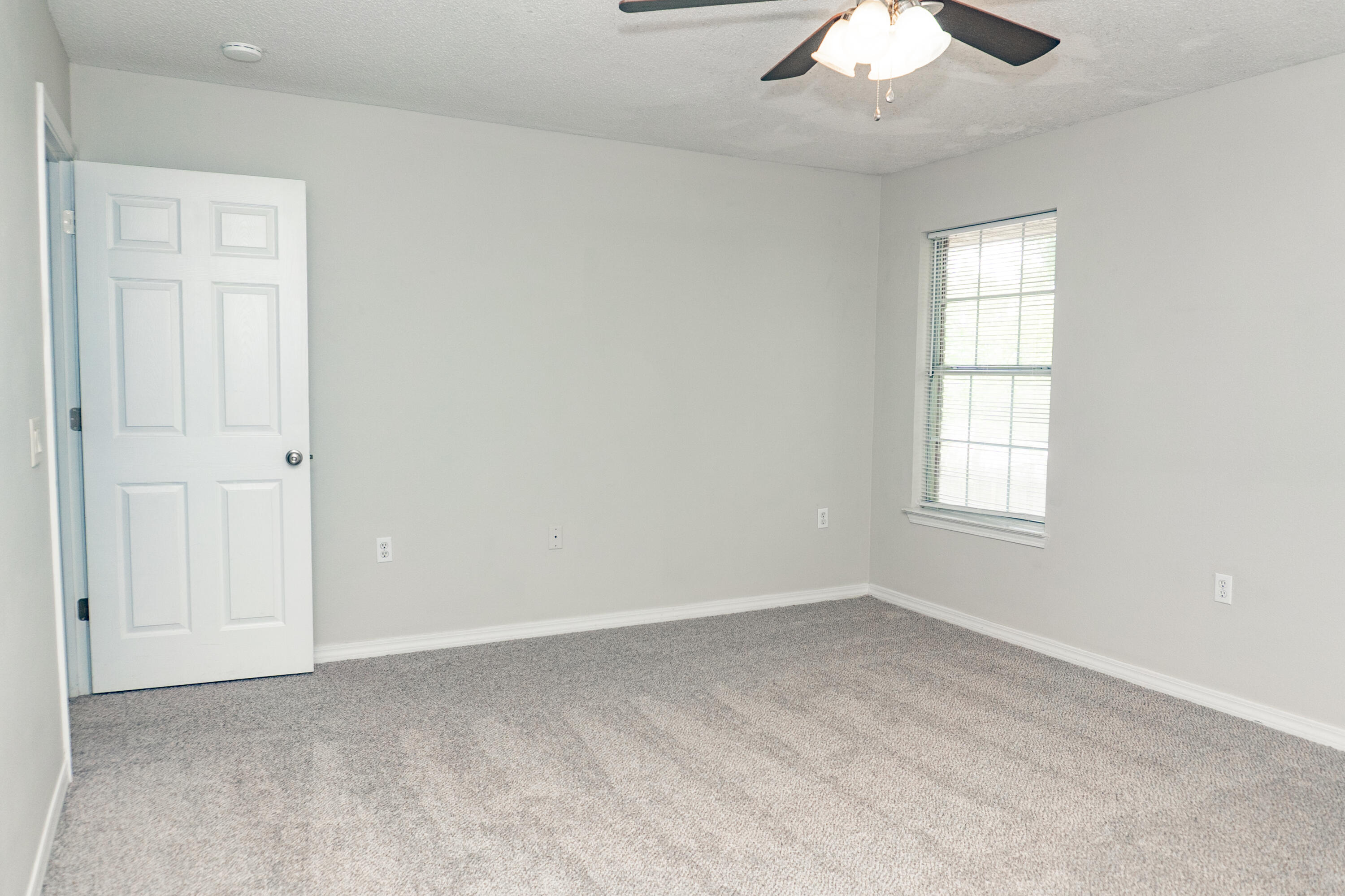 5136 Whitehurst Lane Crestview, FL 32536 - Photo 16 of 24 an empty room with a window