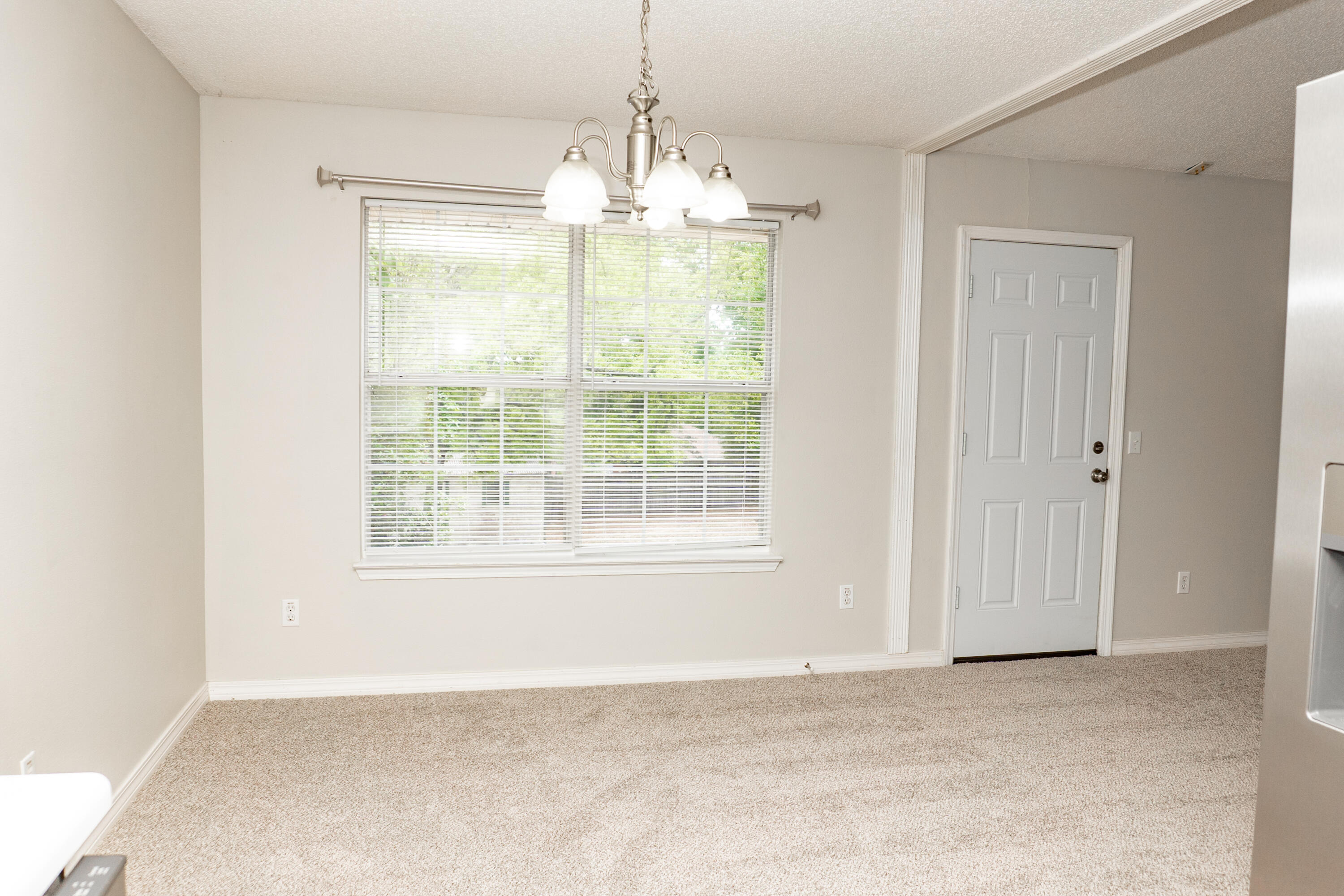 5136 Whitehurst Lane Crestview, FL 32536 - Photo 5 of 24 a view of an empty room with a window