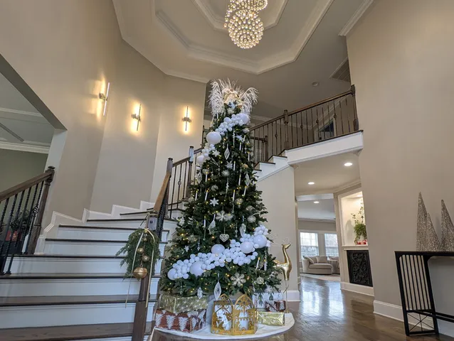 a view of entryway with a flower pot and a chandelier