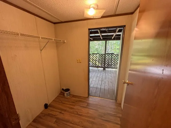 a room with gym equipment and a window