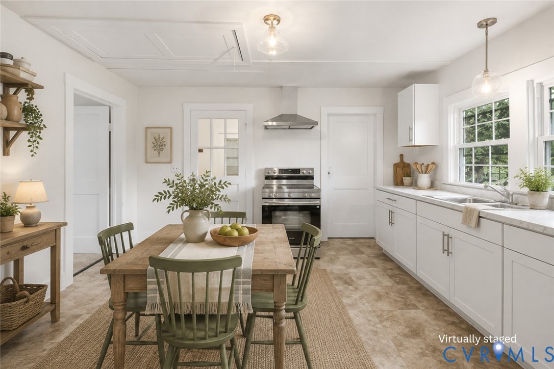 239 Brunswick Road Emporia, VA 23847 - Photo 7 of 24 White cabinetry, stainless steel appliances, dual