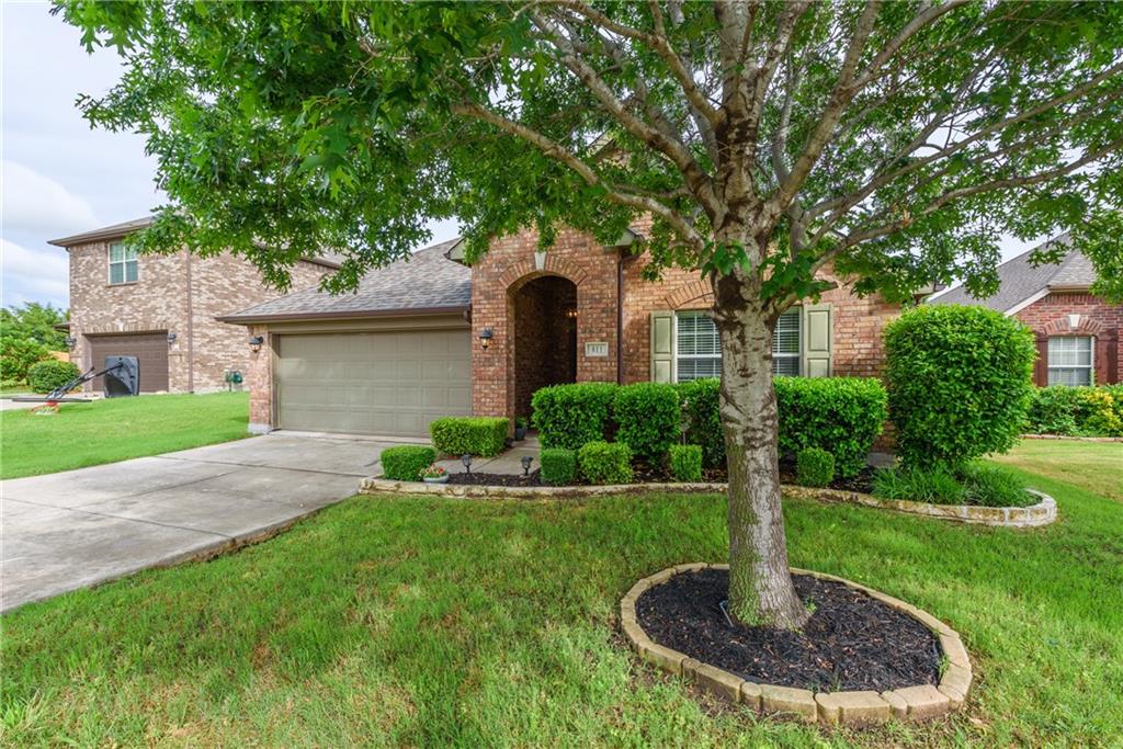811 Horizon Ridge Circle Little Elm, TX 75068 - Photo 1 of 1 a front view of a house with a yard