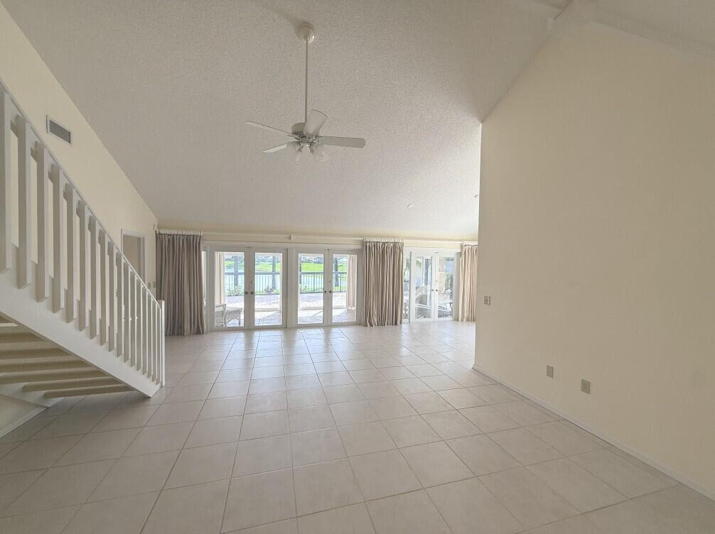 114 Beach Summit Court Jupiter, FL 33477 - Photo 26 of 32 a view of an empty room with a window