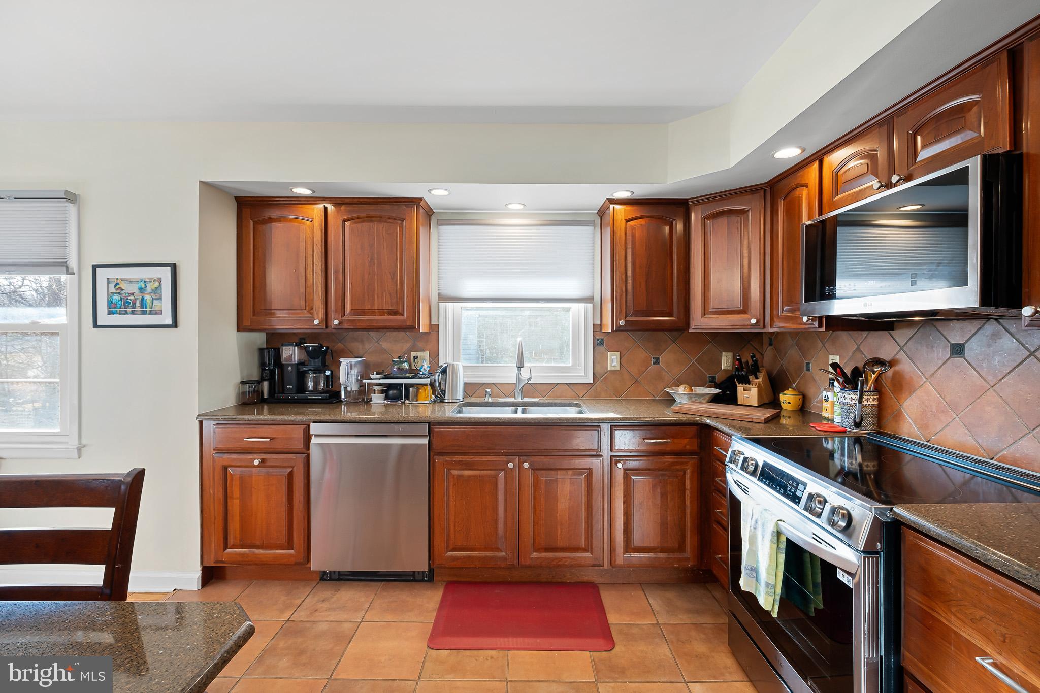 1410 Drake Road Wilmington, DE 19803 - Photo 26 of 30 kitchen w granite counters, & tile floor