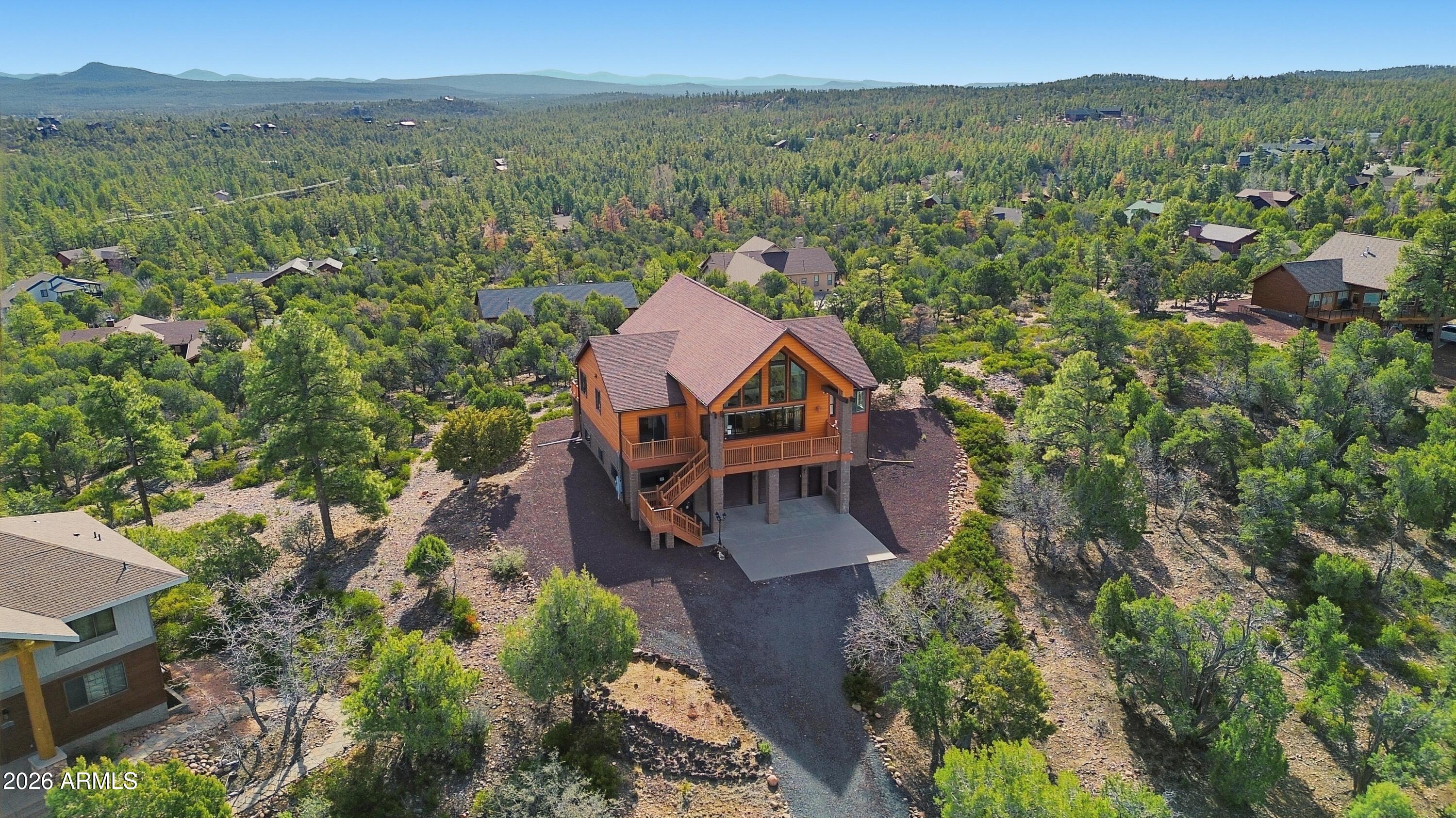 1561 South Canyon Ridge Trail Show Low, AZ 85901 - Photo 58 of 61 an aerial view of a house with a garden