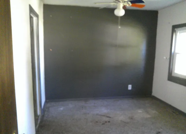 an empty room with a door