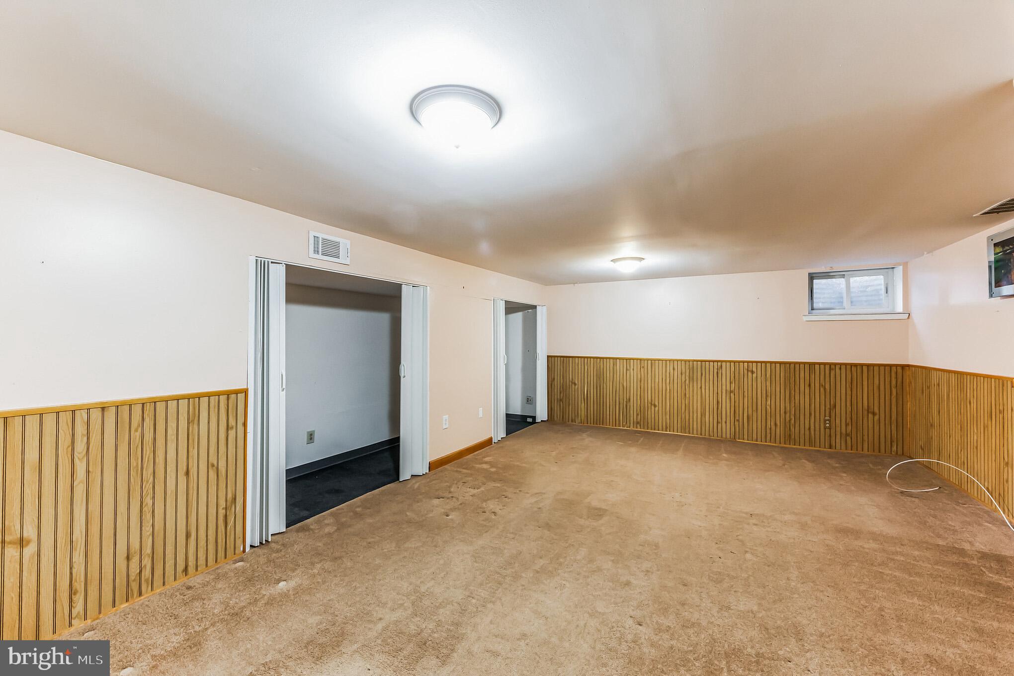 357 Saybrook Lane, Unit 158 Wallingford, PA 19086 - Photo 16 of 18 a view of a room with a garage