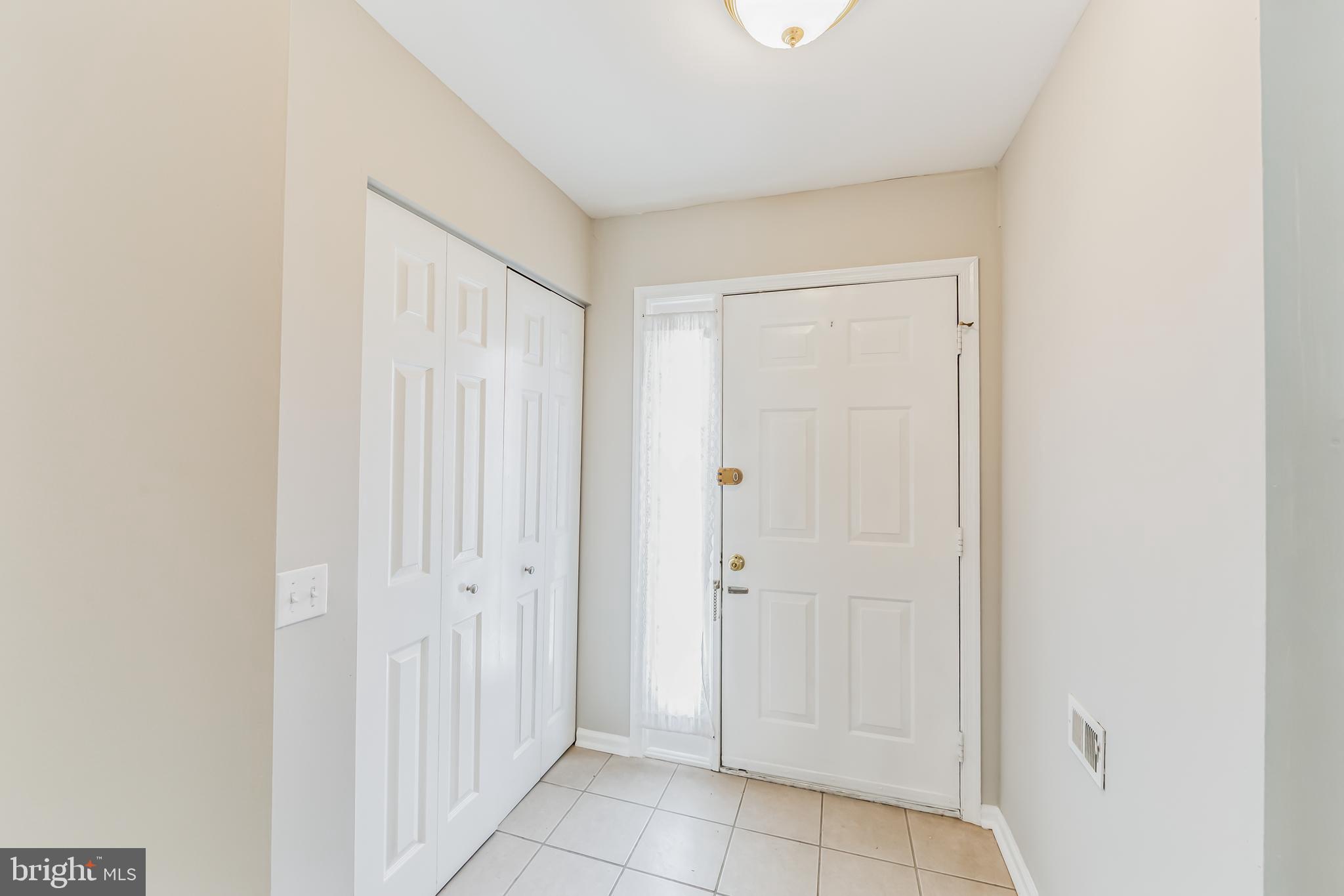 357 Saybrook Lane, Unit 158 Wallingford, PA 19086 - Photo 5 of 18 a view of a hallway with closet area