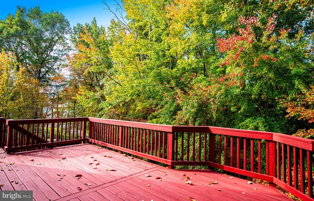 a view of balcony with wooden floor