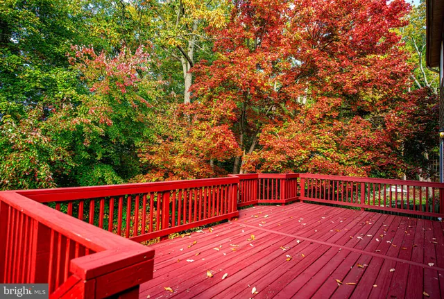 a view of balcony with wooden floor