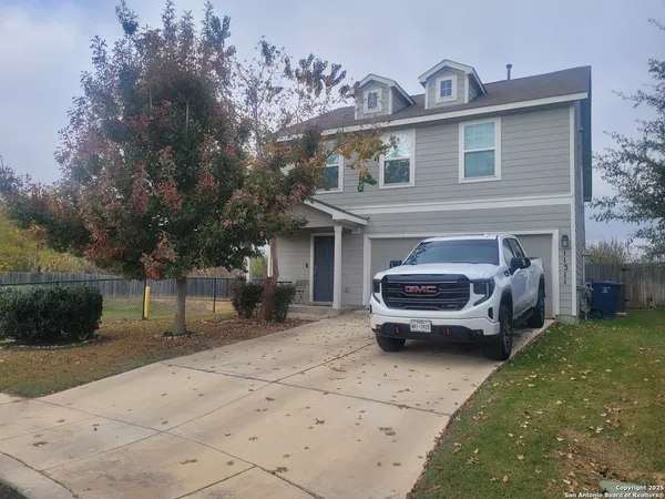 a car parked in front of a house