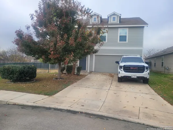 a car parked in front of a house