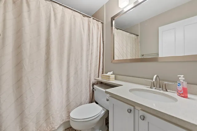 a view of a swimming pool and a balcony