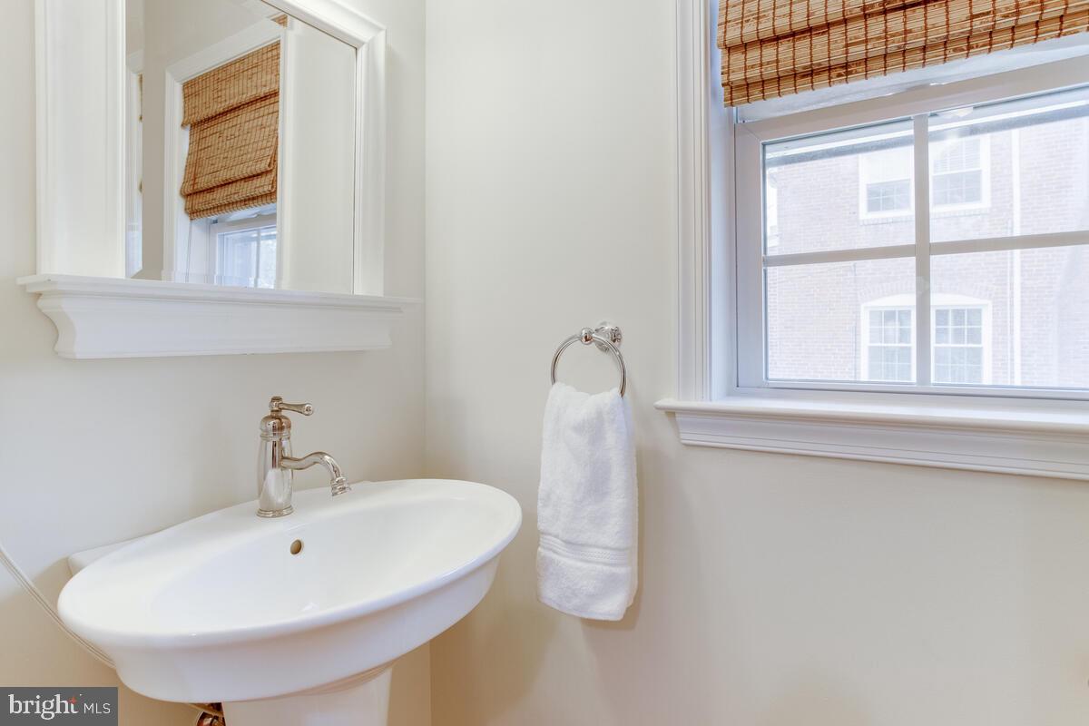 813 Kingston Road Baltimore, MD 21212 - Photo 26 of 55 Half bathroom is off of the mud room