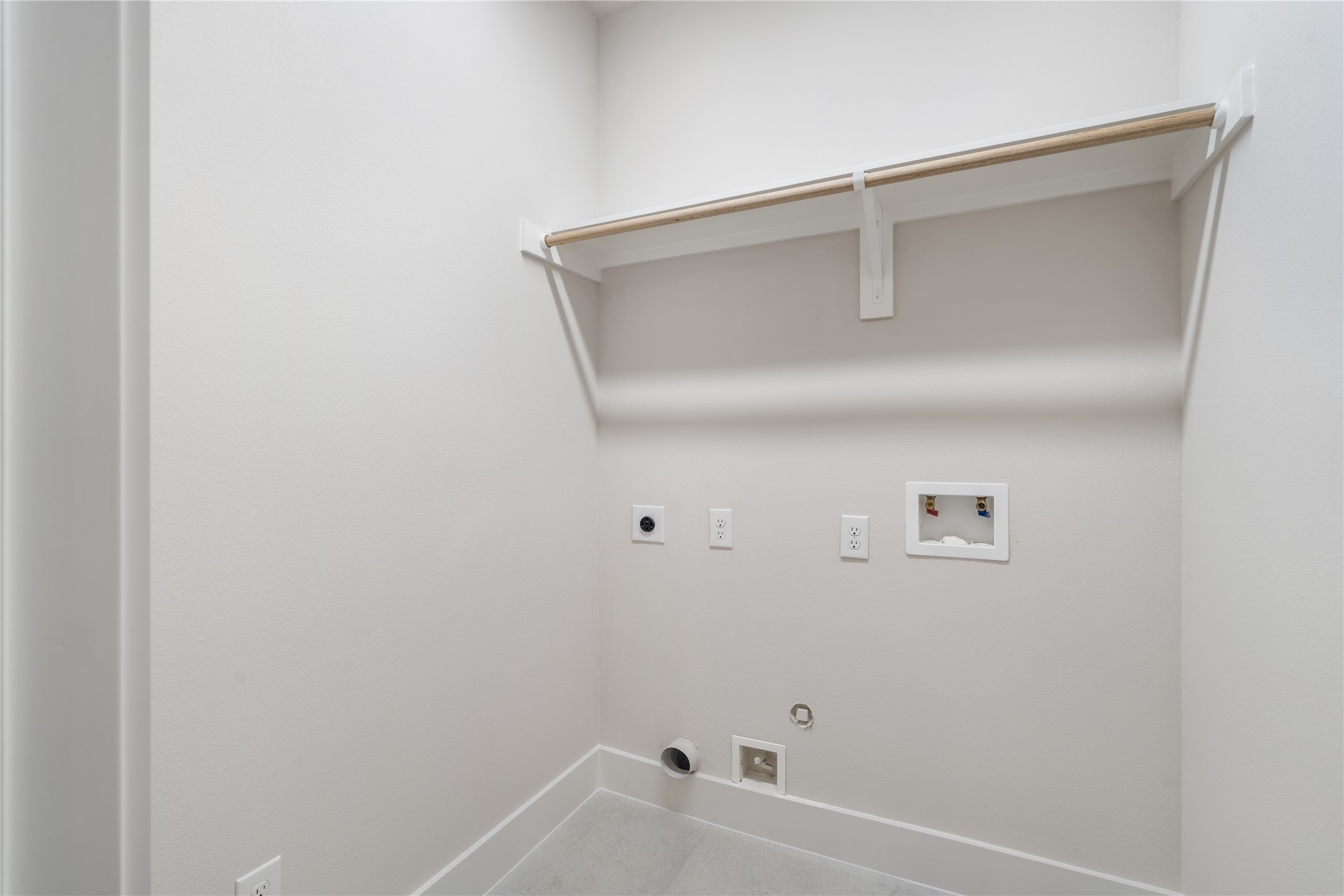1912 Erastus Street Houston, TX 77020 - Photo 26 of 29 A dedicated utility room with built-in shelving.