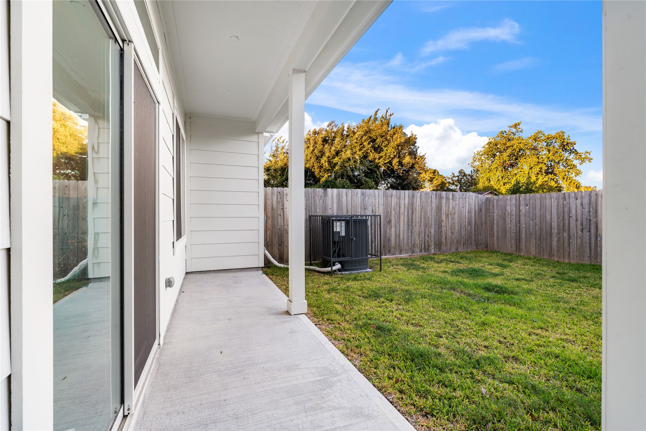 1912 Erastus Street Houston, TX 77020 - Photo 27 of 29 Your covered patio offers a peaceful place to unwind, with the A/C unit intentionally positioned away from the living room for added quiet and comfort. It’s this kind of attention to detail that defines every Parra Homes build.
