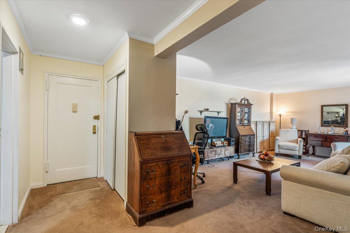 144-60 Gravett Road, Unit 6F Queens, NY 11367 - Photo 11 of 20 a living room with furniture and a couch