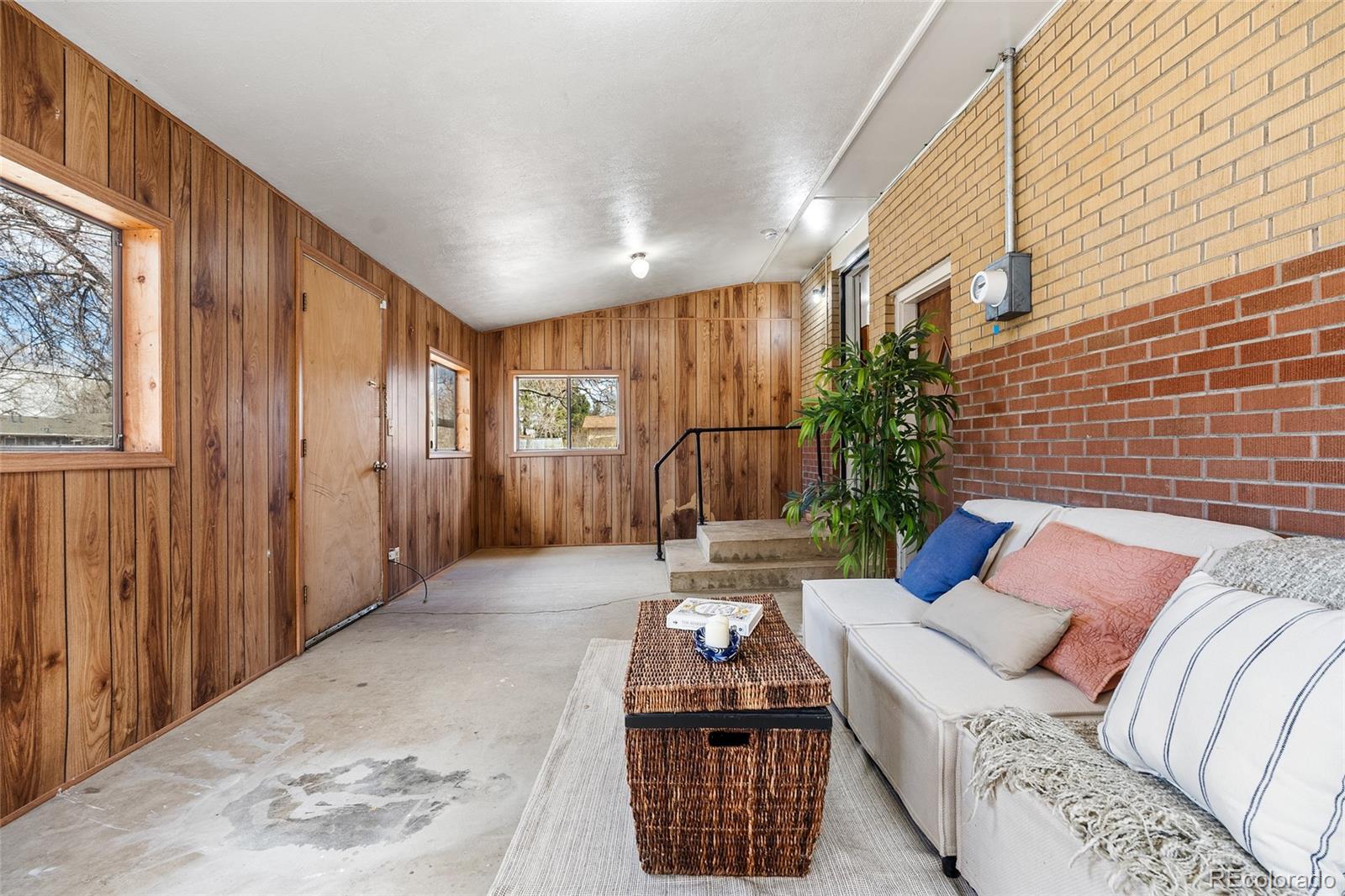 4585 Garland Street Wheat Ridge, CO 80033 - Photo 23 of 35 a living room with furniture