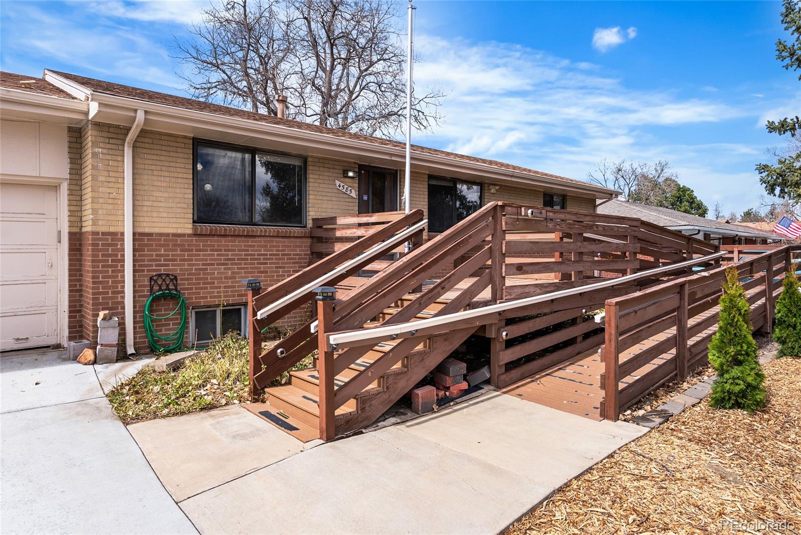 4585 Garland Street Wheat Ridge, CO 80033 - Photo 29 of 35 a view of a house with a large window