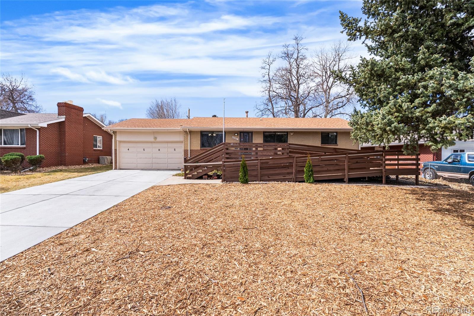 4585 Garland Street Wheat Ridge, CO 80033 - Photo 30 of 35 a view of a terrace with wooden fence