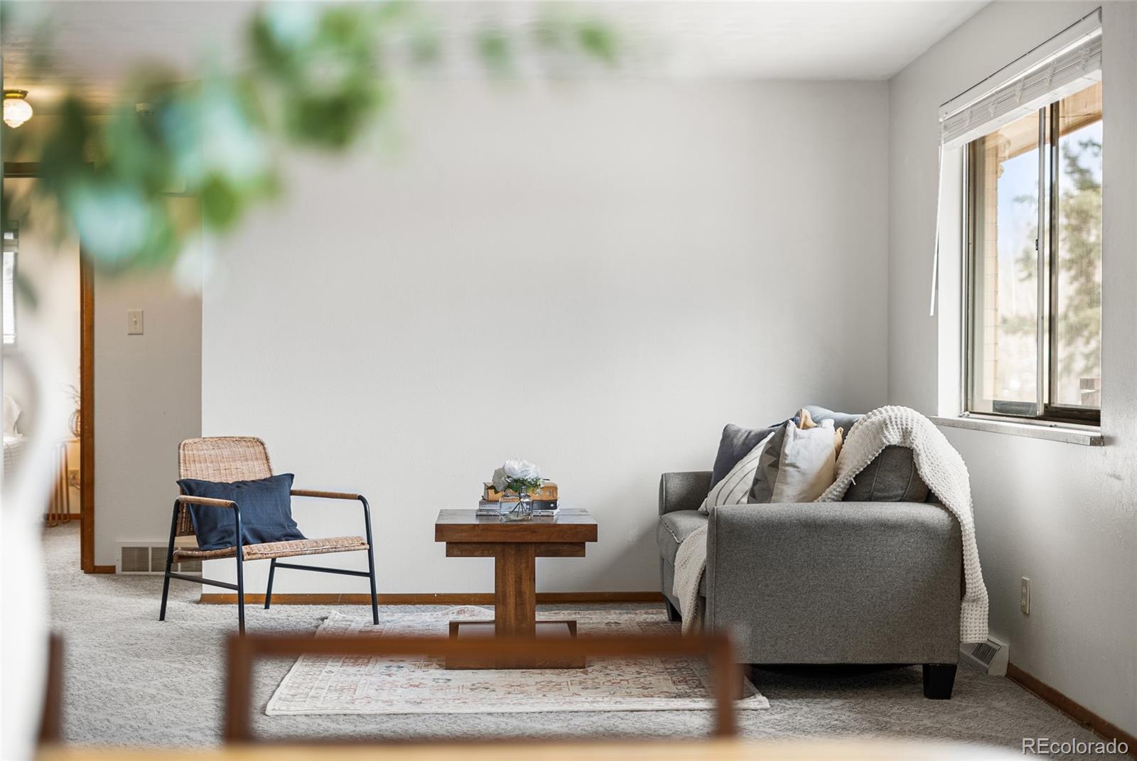 4585 Garland Street Wheat Ridge, CO 80033 - Photo 3 of 35 a living room with furniture