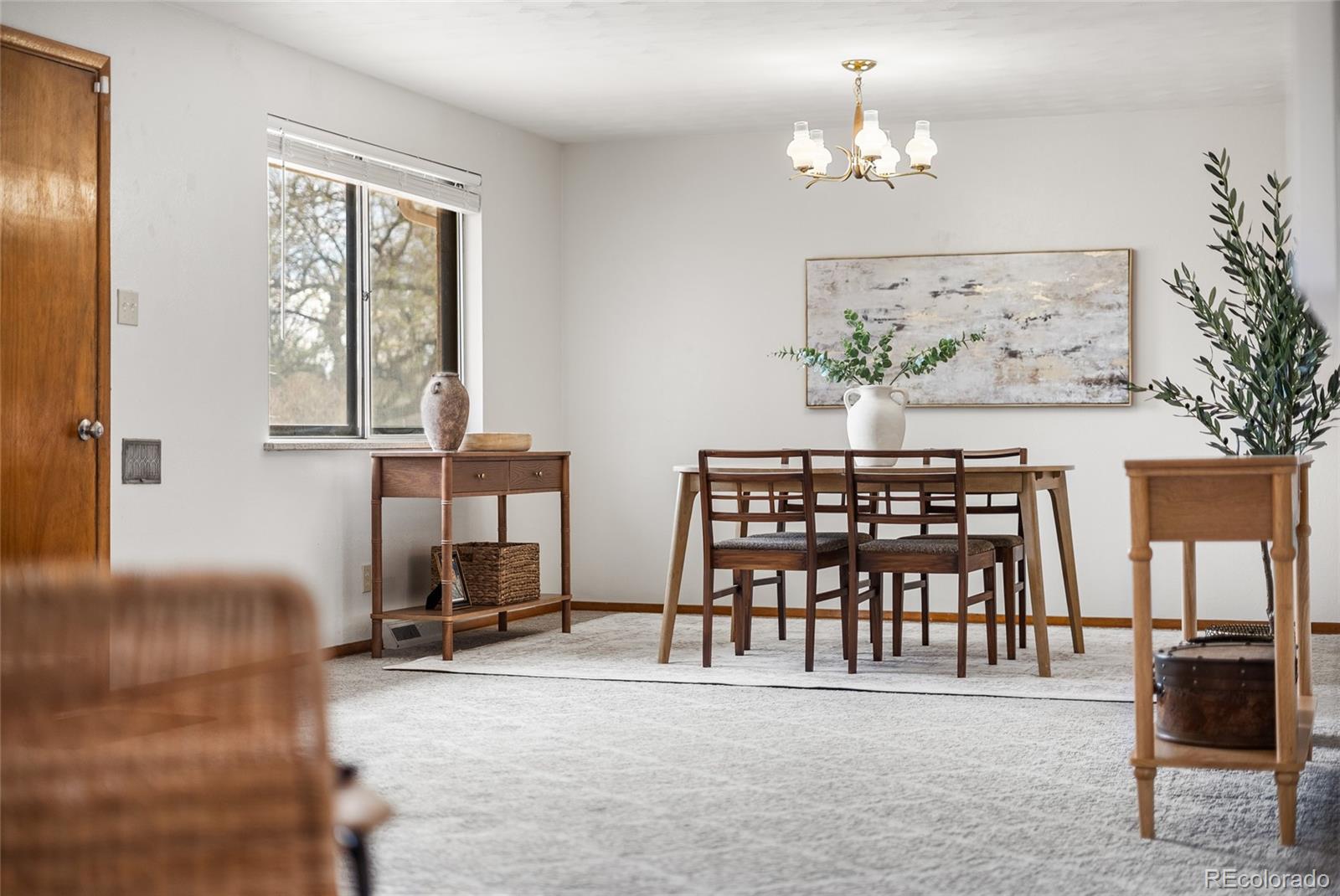4585 Garland Street Wheat Ridge, CO 80033 - Photo 6 of 35 a view of a livingroom with furniture and window